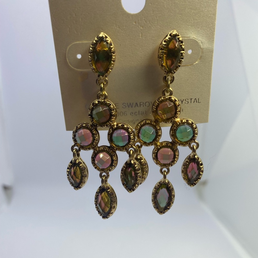 Gold tone & Greenish pink crystal pierced earrings.